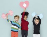 gene therapy | AADC News | Children holding placards denoting strength
