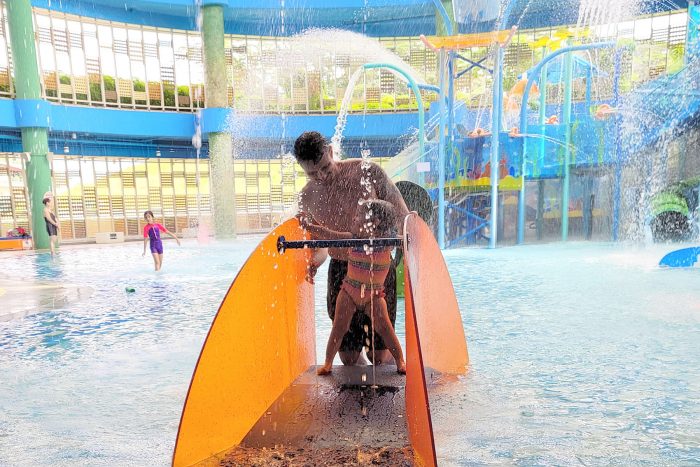 water therapy | AADC News | Richard and Rylae-Ann work on water sensory play at an indoor water park.