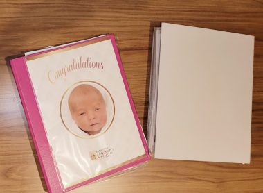 Online Medical Records | AADC News | A storage binder and folders containing copies of Rylae-Ann's medical information.