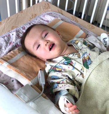 cerebral palsy | AADC News | photo of Rylae-Ann in a crib in the hospital, recovering from a lumbar puncture