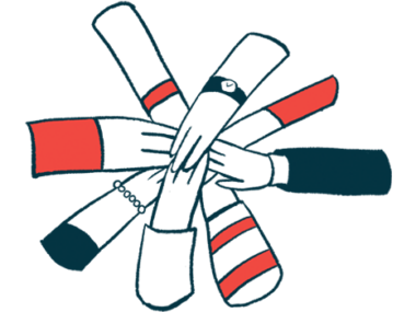 Hands come together in a circle in a show of support.