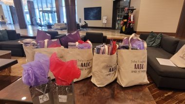 aadc deficiency | AADC News | Supportive gift bags line a table at a recent AADC deficiency family meetup in Houston